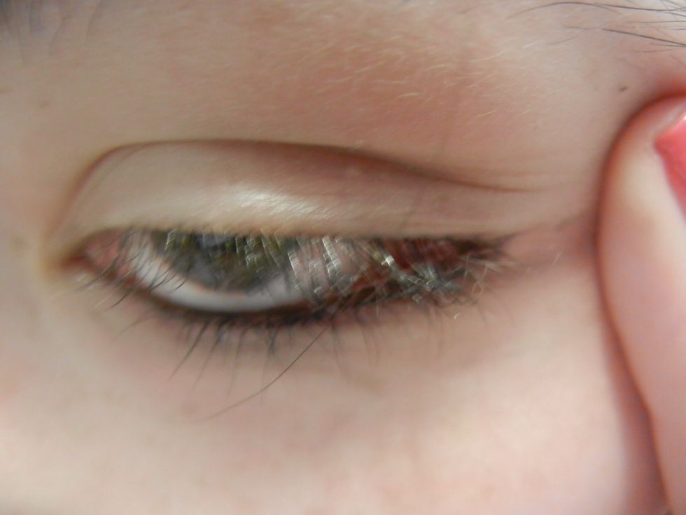 To line your upper lid, pull gently to the side with your non-dominant hand. This gives you a smoother surface to line and lets you see much more clearly!