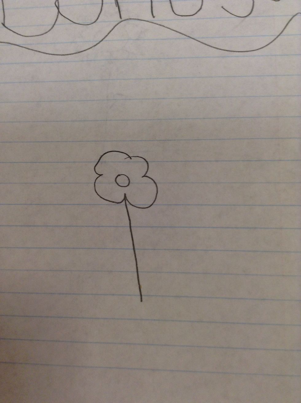 To make a small flower create a cloud shape and draw a circle in the center,then add a stem.