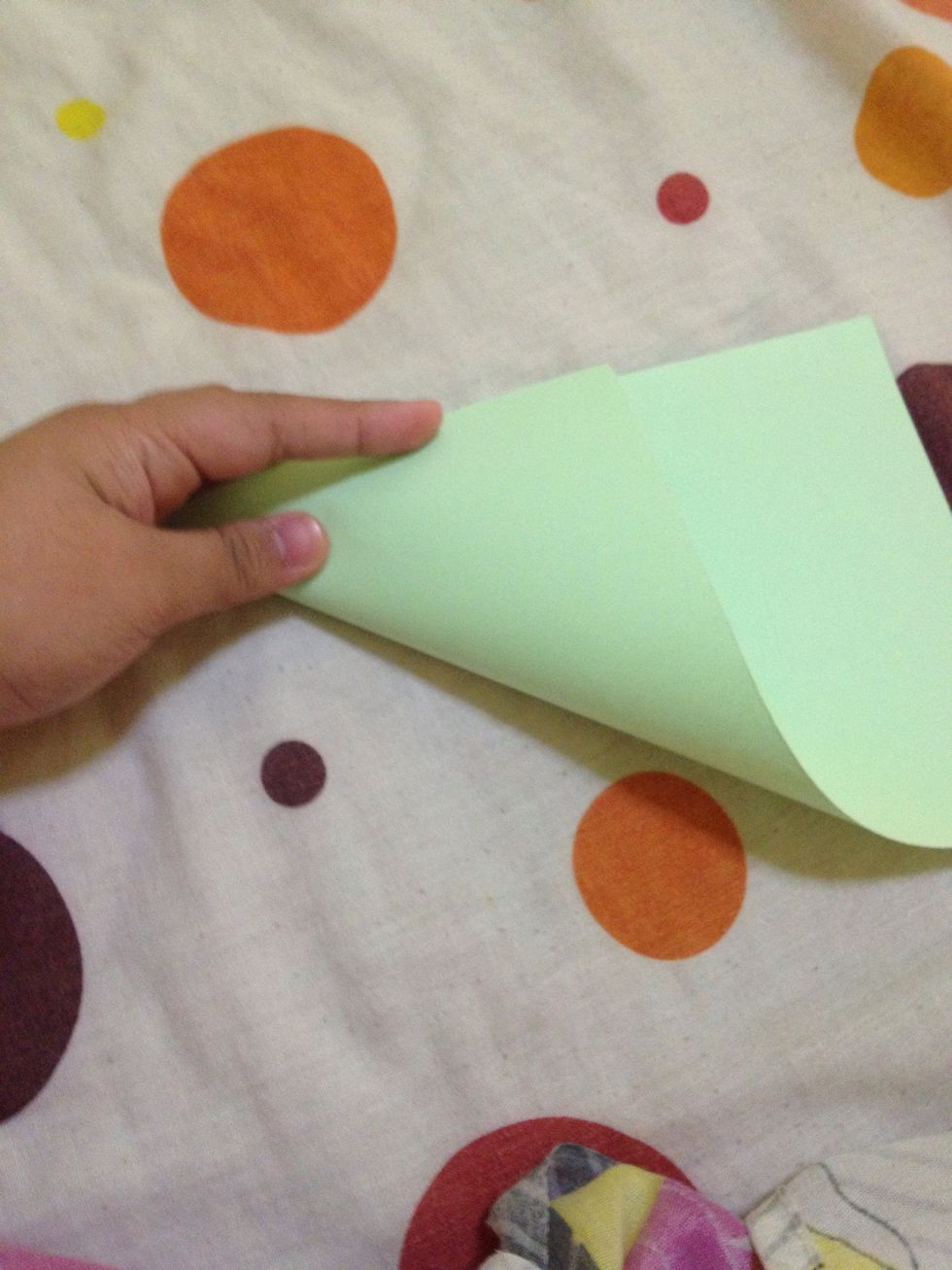 To make a square, fold a corner.