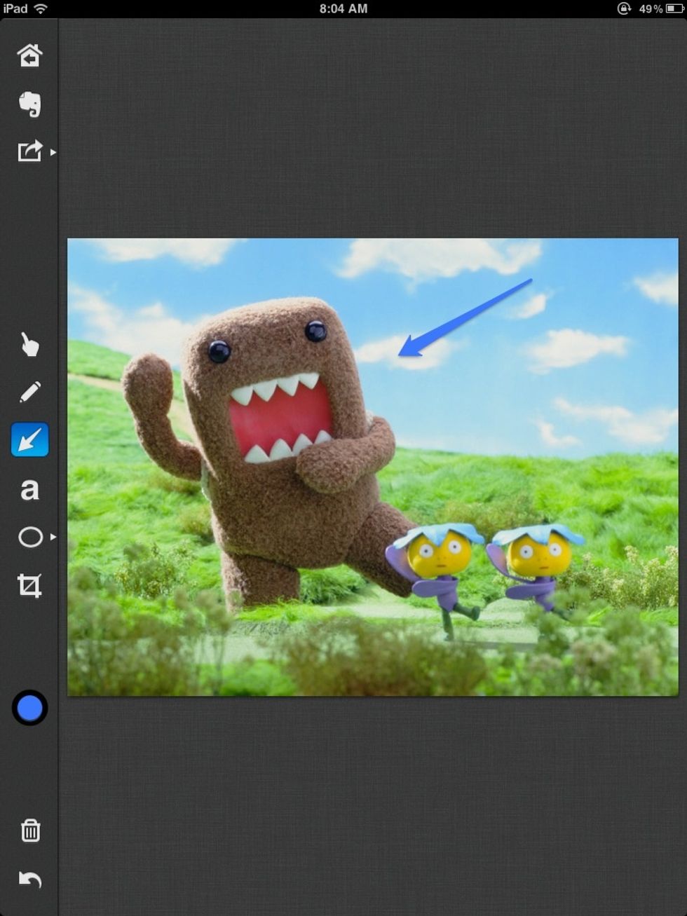 To make an arrow click on the arrow tab and click on the photo and drag the arrow.