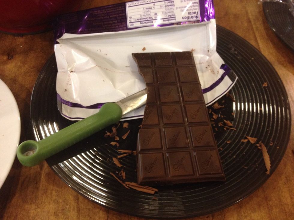 To make chocolate shavings I ran the knife down a chocolate bar at a 45 degree angle and it gave me thin shavings