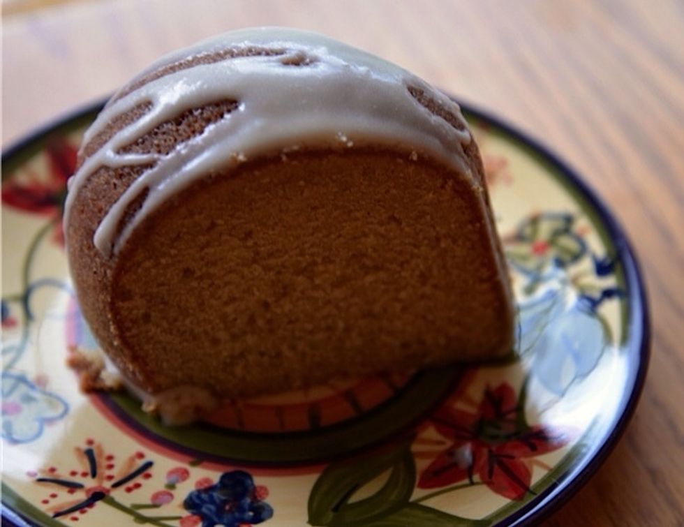 To make glaze, heat butter, rum and vanilla extract in sauce pan, simmer for 3 minutes. Let cool for 15 min, then whisk in powdered sugar! Yummy yummy!