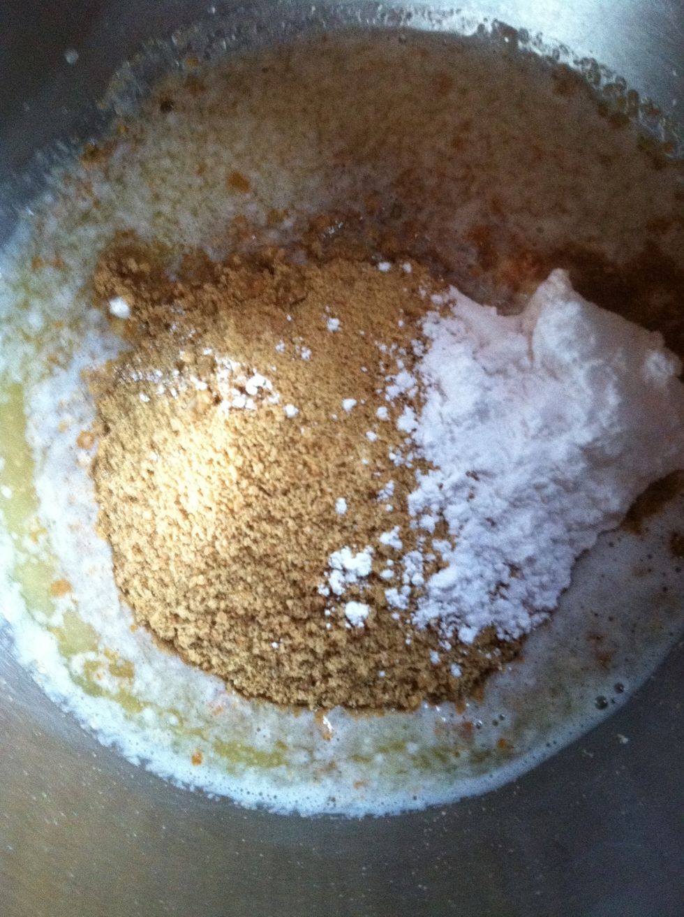 To make graham cracker crust, in food processor, pulse till fine 13 crackers. Add melted butter and powdered sugar and pulse until it comes together.