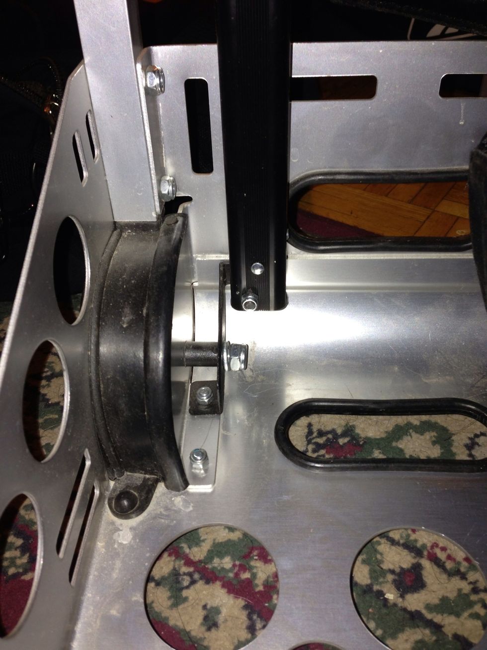 To make it easier, I've pushed the bag to one side (Instead if removing the entire bag from the frame). Now I have access to the locking nut.