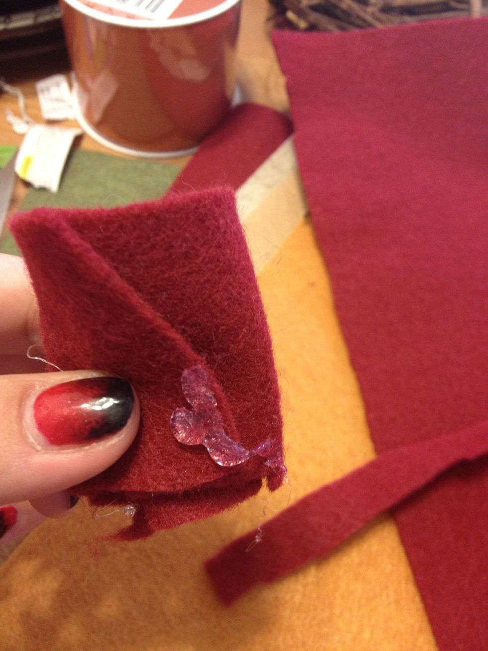 To make it larger I cut another strip and add to the existing flower. A dabb of glue...