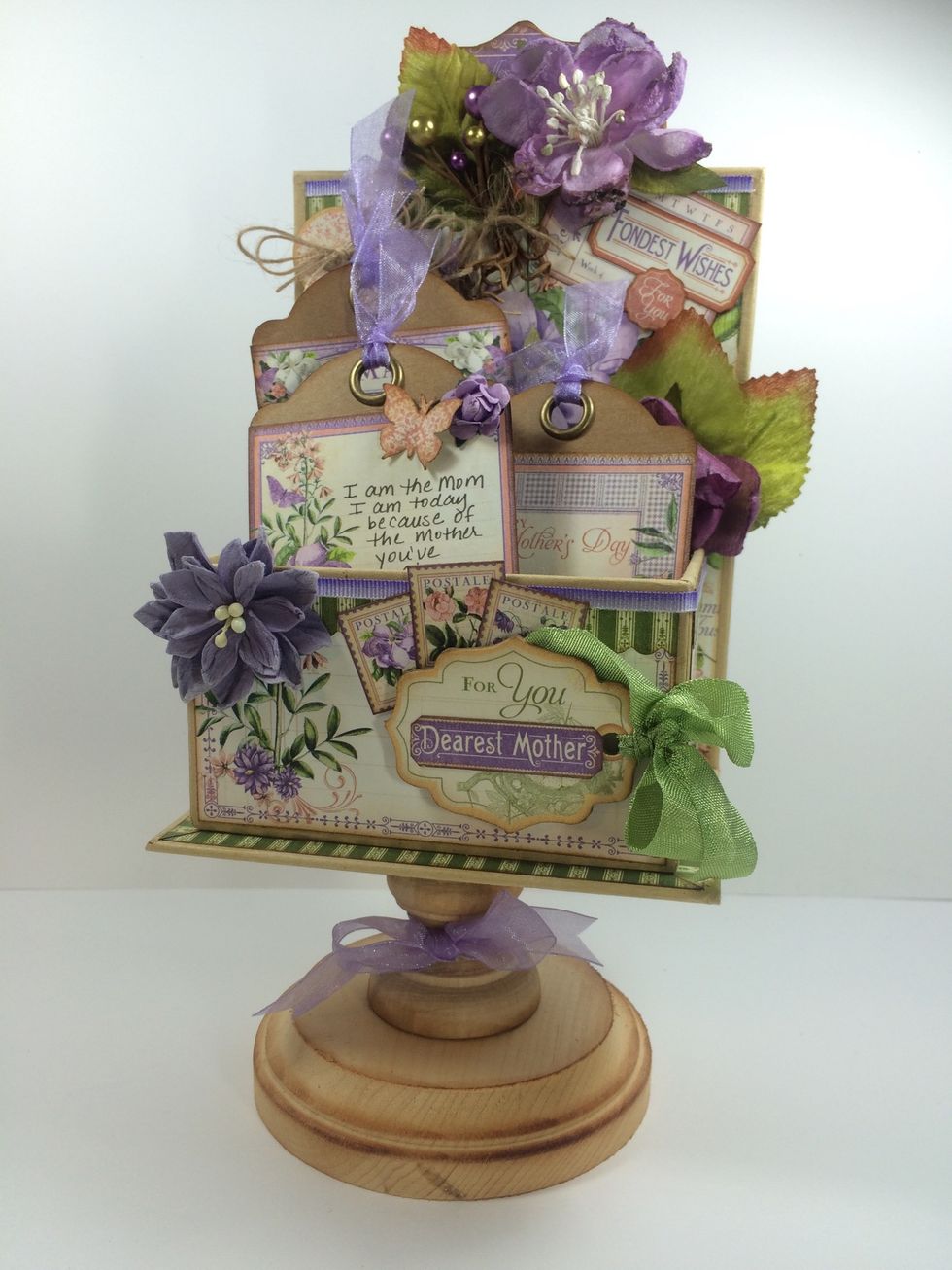 To make it more solid and balanced, add a round wooden base to the bottom. NOW it's done!