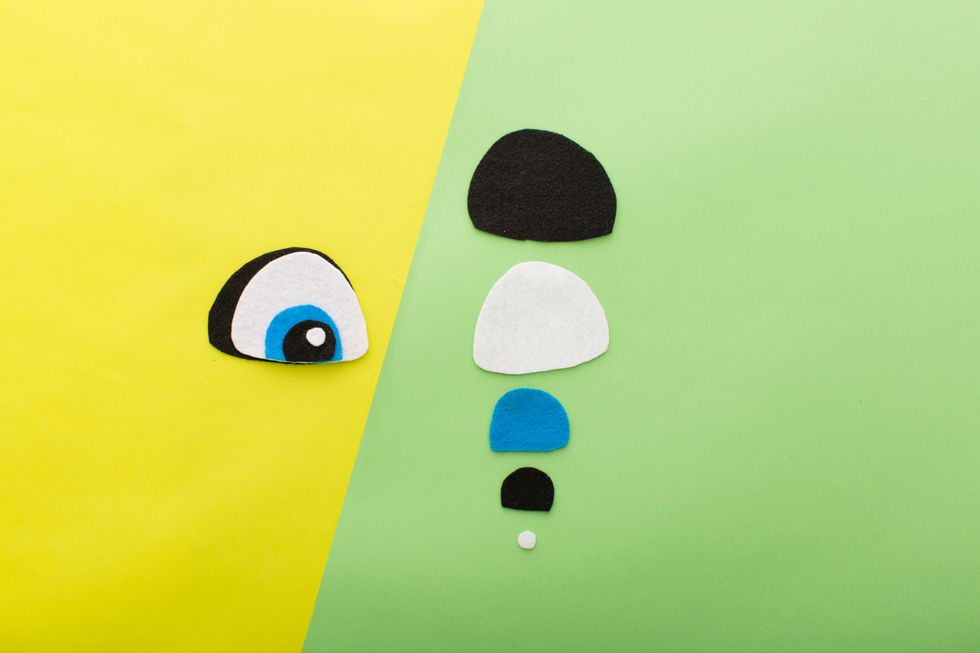 To make Judy\u2019s eyes, cut out large half-circles of felt in black, white and blue.