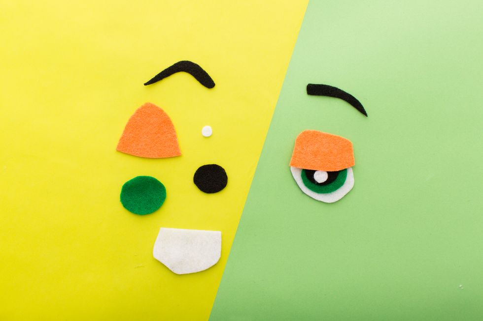 To make Nick\u2019s backpack, repeat the steps above with orange, white, green and black felt.