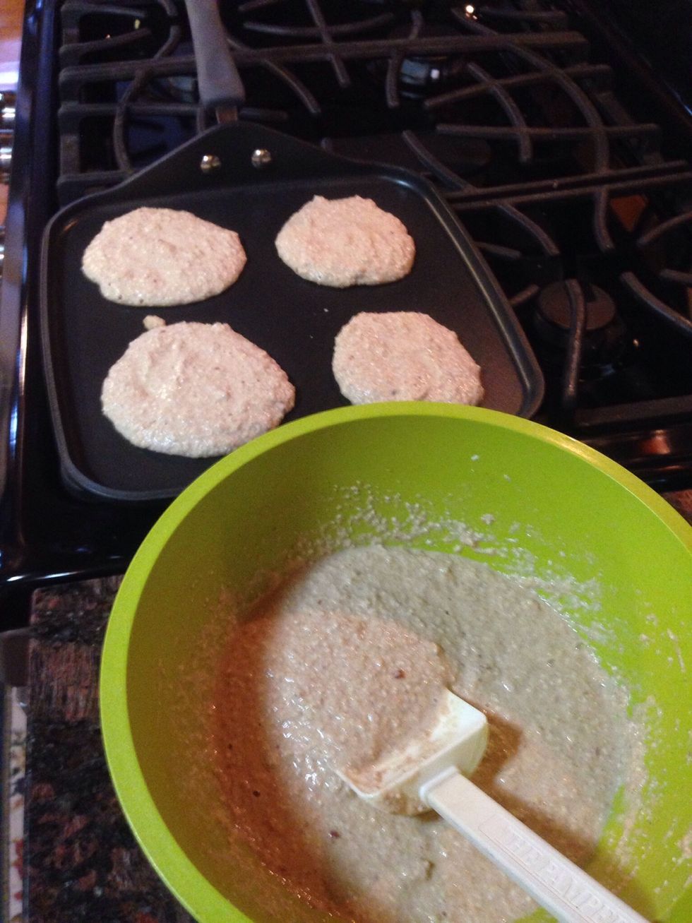 To make oat "flour," put remaining 2 cups of oats in Vitamix and blend on setting 4 until finely processed. Combine oat flour with 1.5 cups oat milk, and your applesauce. Drop onto hot griddle.