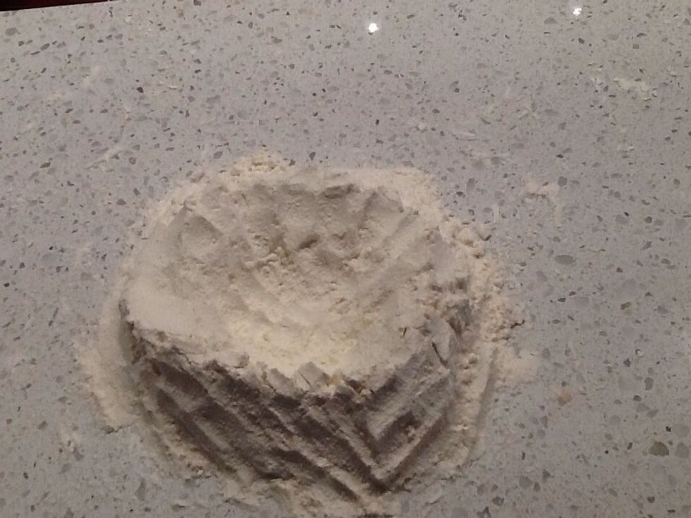 To make pasta make a well of flour.