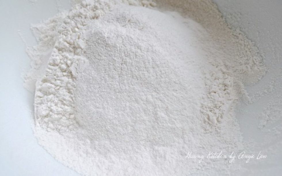To make pie tee shells, we must first make the batter so In a mixing bowl, add in the sifted all-purpose flour,rice flour and salt.