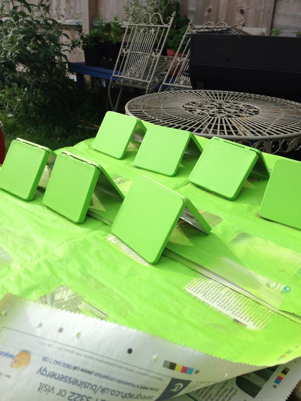 To make sure the ends were painted I stood the tins on end.