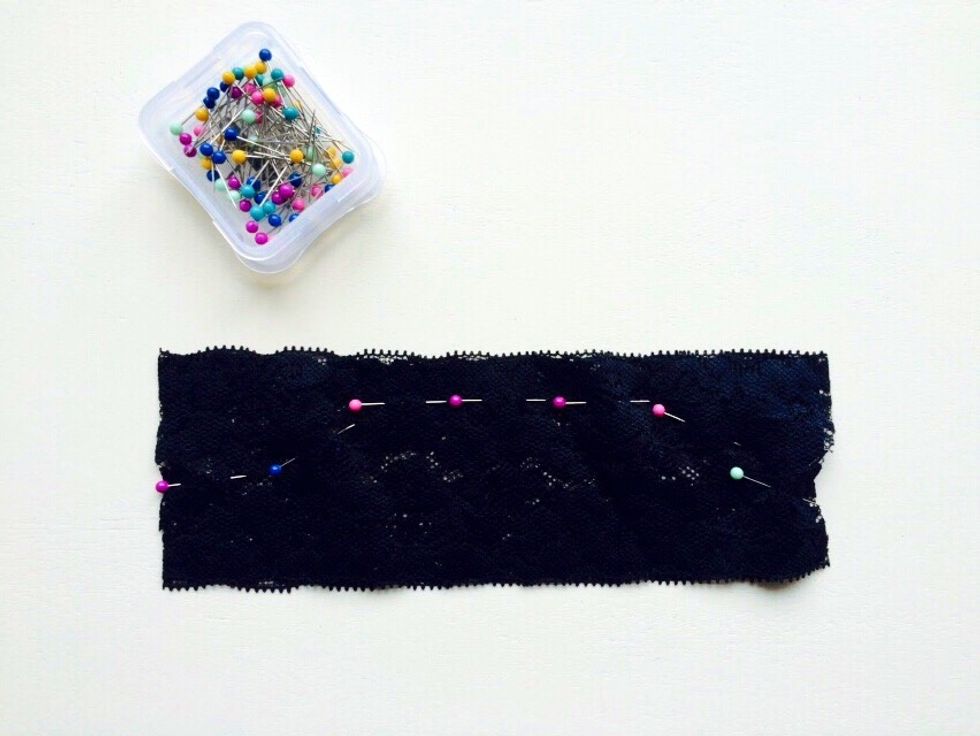 To make the back, lay the two pieces of lace on top of each other then pin a curved line that looks like a hill. It's important that one end matches up with the crotch so keep that in mind.