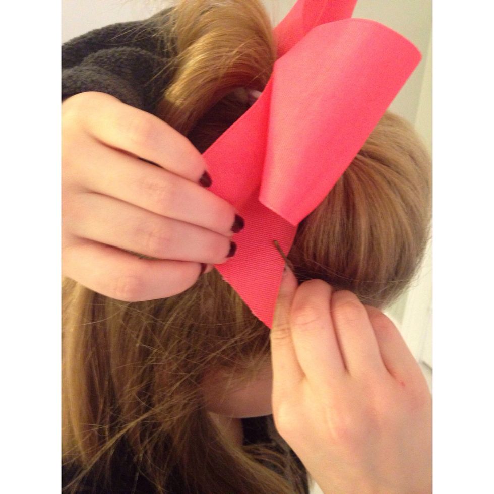 To make the bow more secure, add bobby pins to each side of the bow.