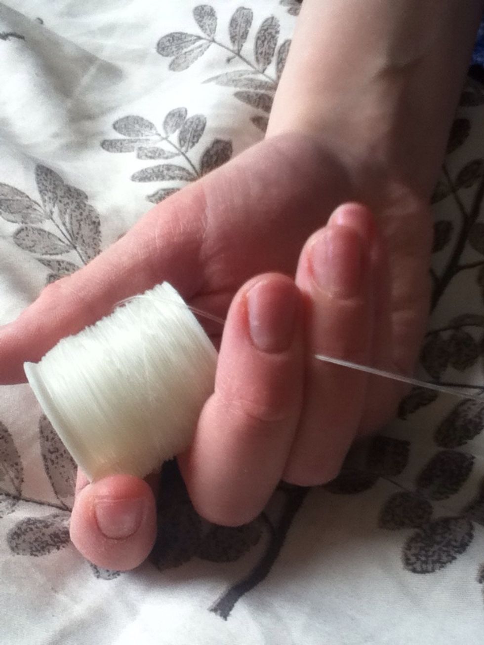 To make the bracelet you will need elastic thread.