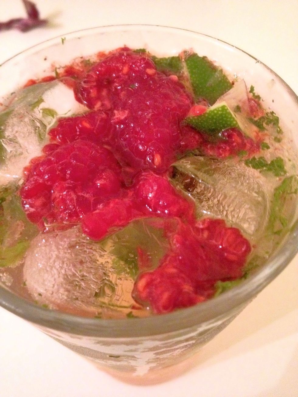 To make the drink even prettier, muddle some raspberries and add them to the mix.