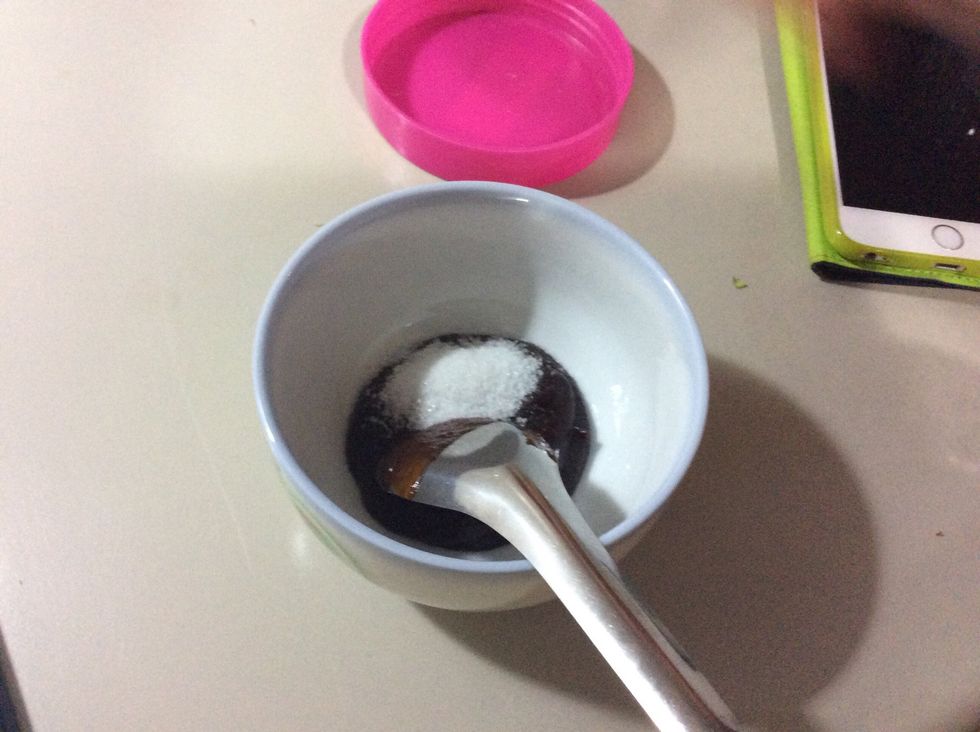 To make the hoisin sauce you would like to put the sauce in a bowl, after that put a tablespoon of sugar in the same bowl, after that put warm water in it as well and mix for about 2 minutes.
