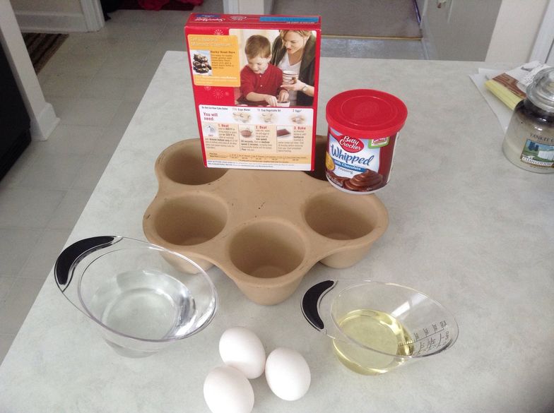https://guides.brit.co/media-library/to-make-the-lava-cake-you-will-need-a-box-cake-mix-and-the-required-ingredient-eggs-oil-water-and-the-pampered-chef-single.jpg?id=24236638&width=784&quality=85
