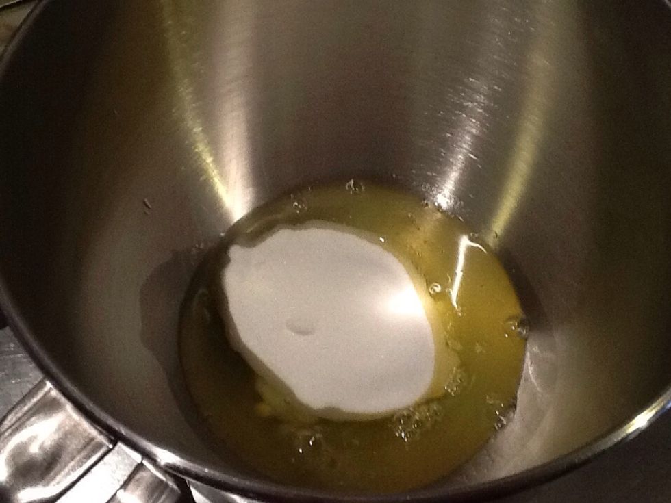 To make the meringue In a electric beater bowl add sugar and egg yolk.