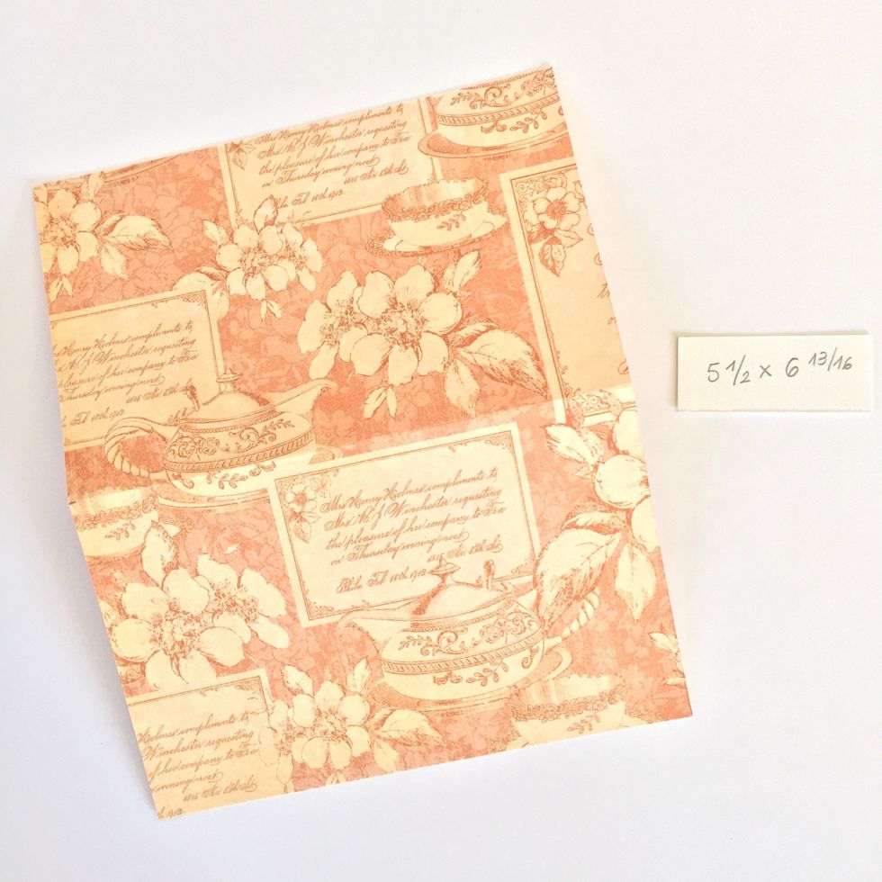 To make the pages, cut four pieces of different papers of 5 \u00bd" x 6 13/16 \u201c and fold them in half.