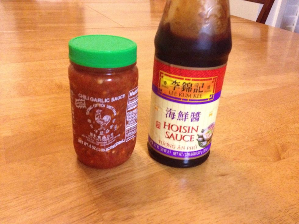 To make the peanut hoisin dipping sauce, combine peanut butter, water, hoisin sauce, lime juice, soy sauce, sugar, chili-garlic paste (pictured here), and garlic together. Serve with the summer rolls.