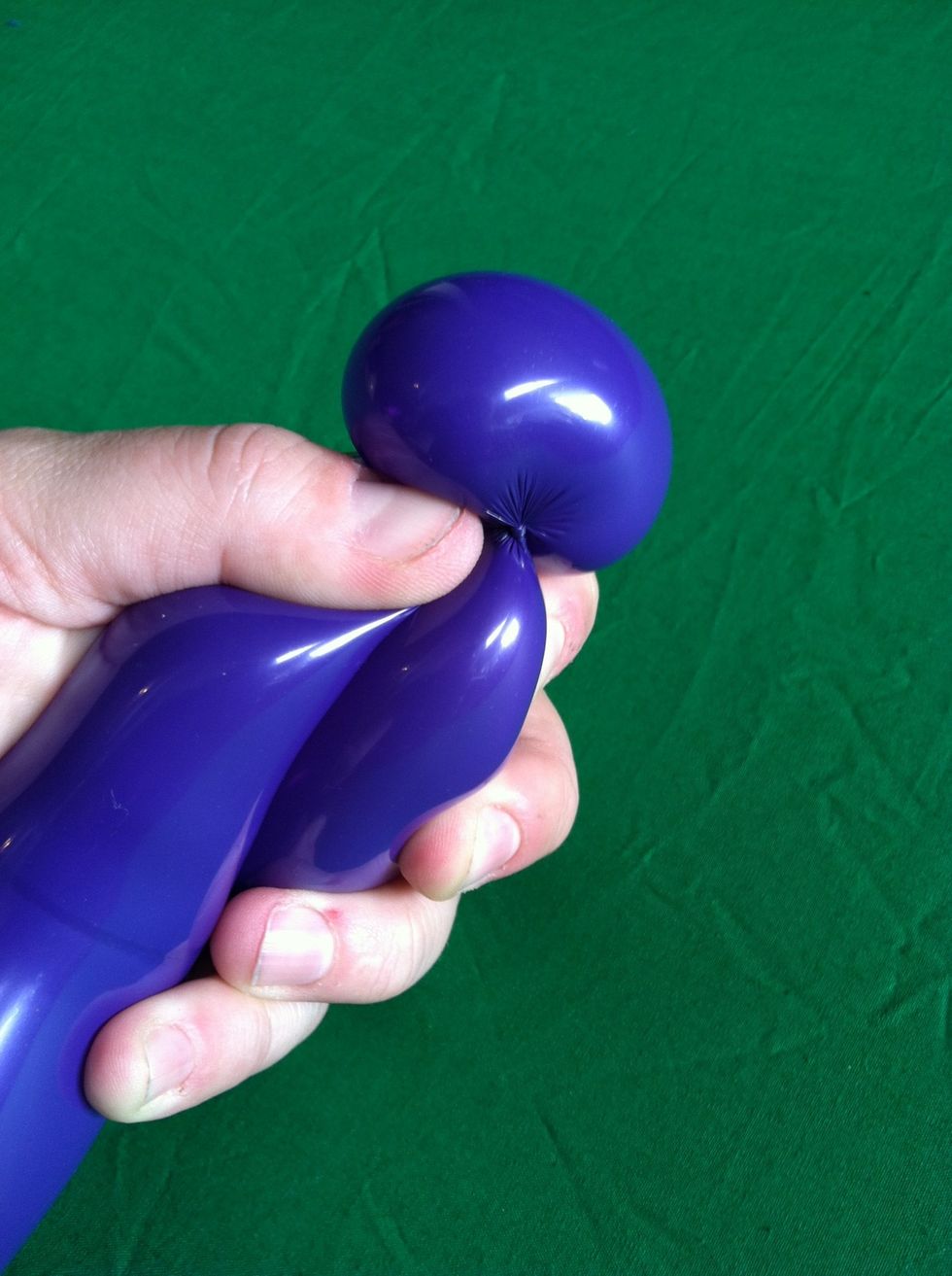 To make the pinch twist, squeeze the two sides of the bubble together while you pull up and twist.