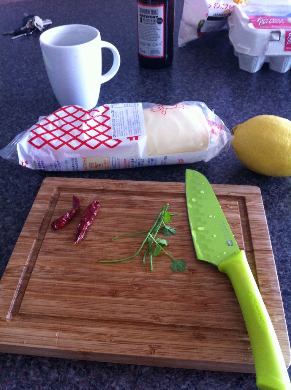 To make the sauce - you need chilli (we are using dry ones), QP mayo, lemon and coriander and chives (optional)
