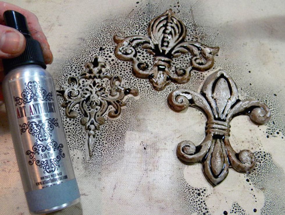 To make them look more like iron, I sprayed them heavily with Silk Tie Colorations Spray and let them sit overnight.