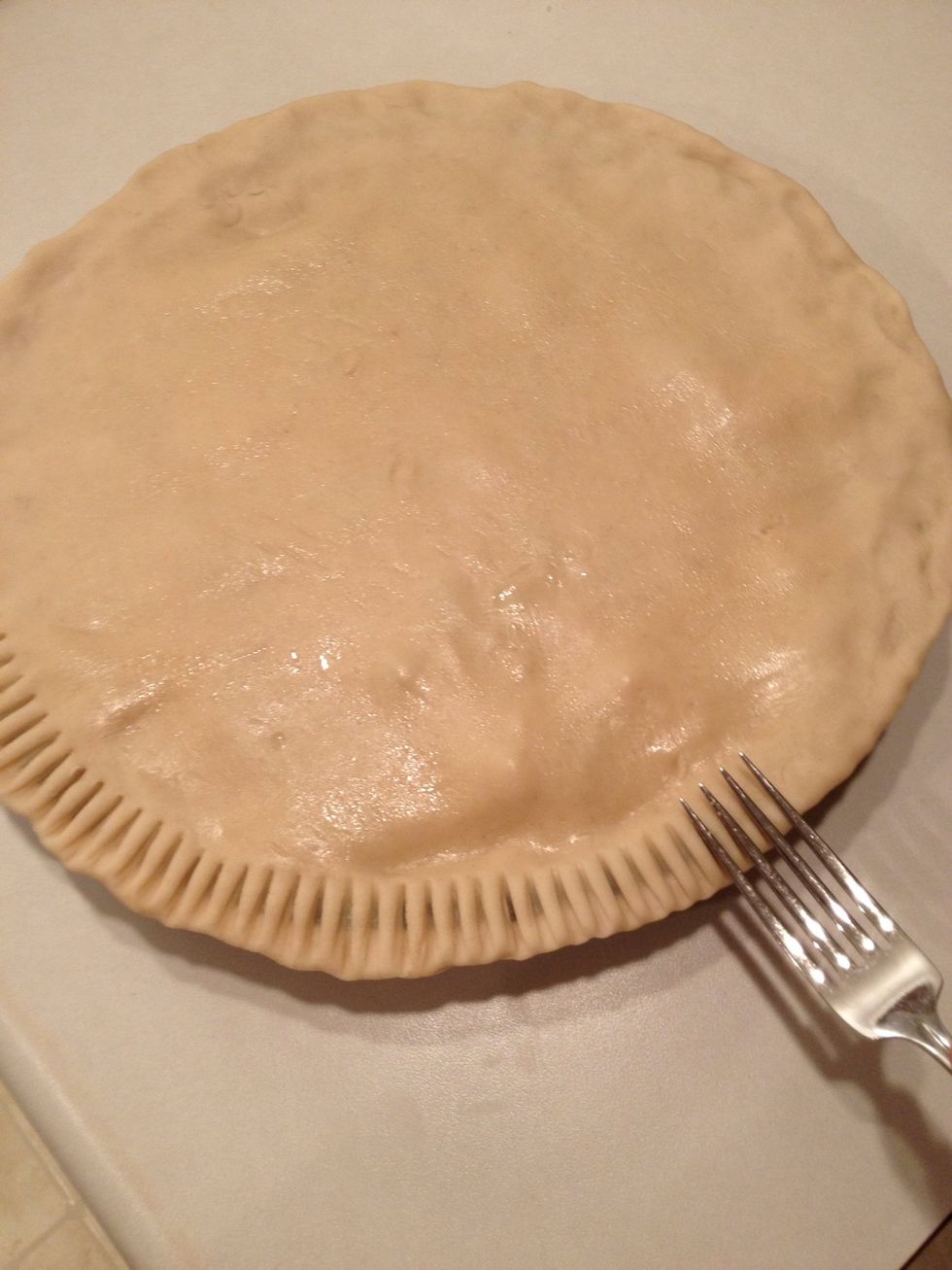 To make this traditional edging for your pot pie, press the tines of a fork around the edge.