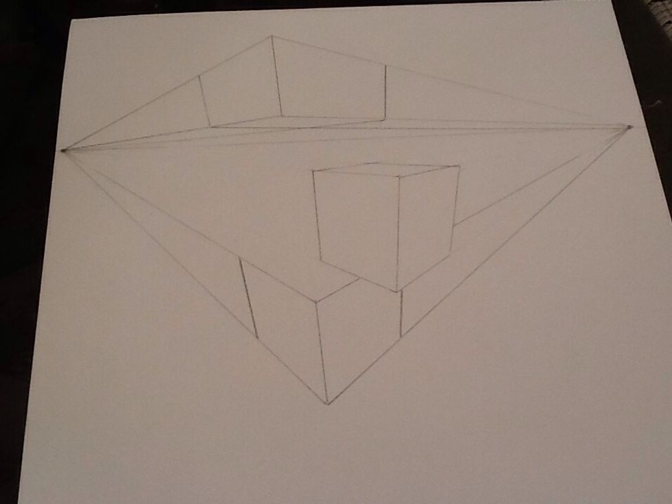 To make your boxes look stacked, line your ruler up with the vanishing points but do not draw threw the previous box. All the extra lines will get confusing.