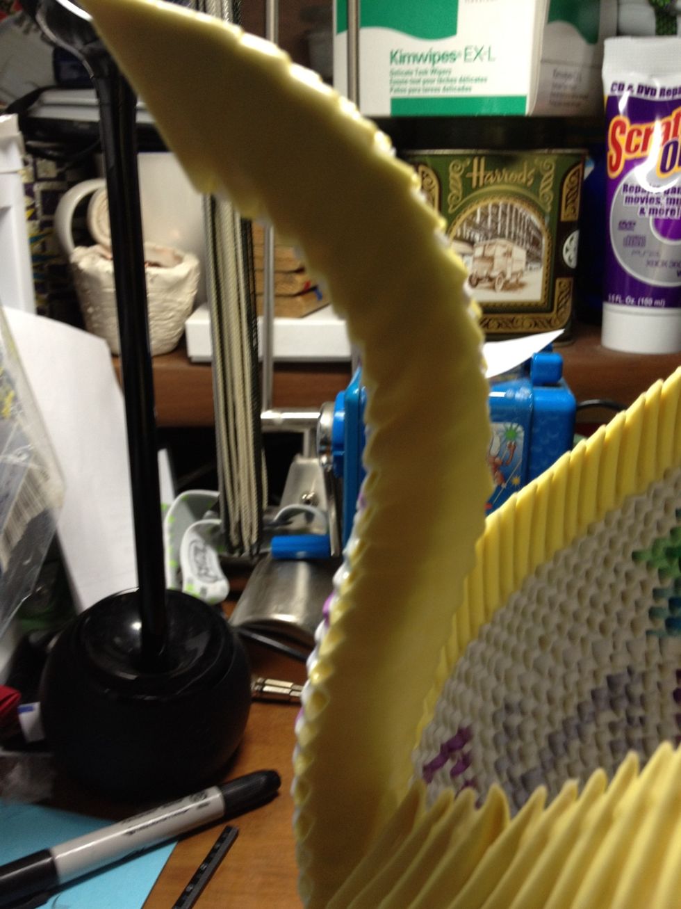 To me, the head is complete when I am able to bend the middle of the head to form that swan head-like shape.