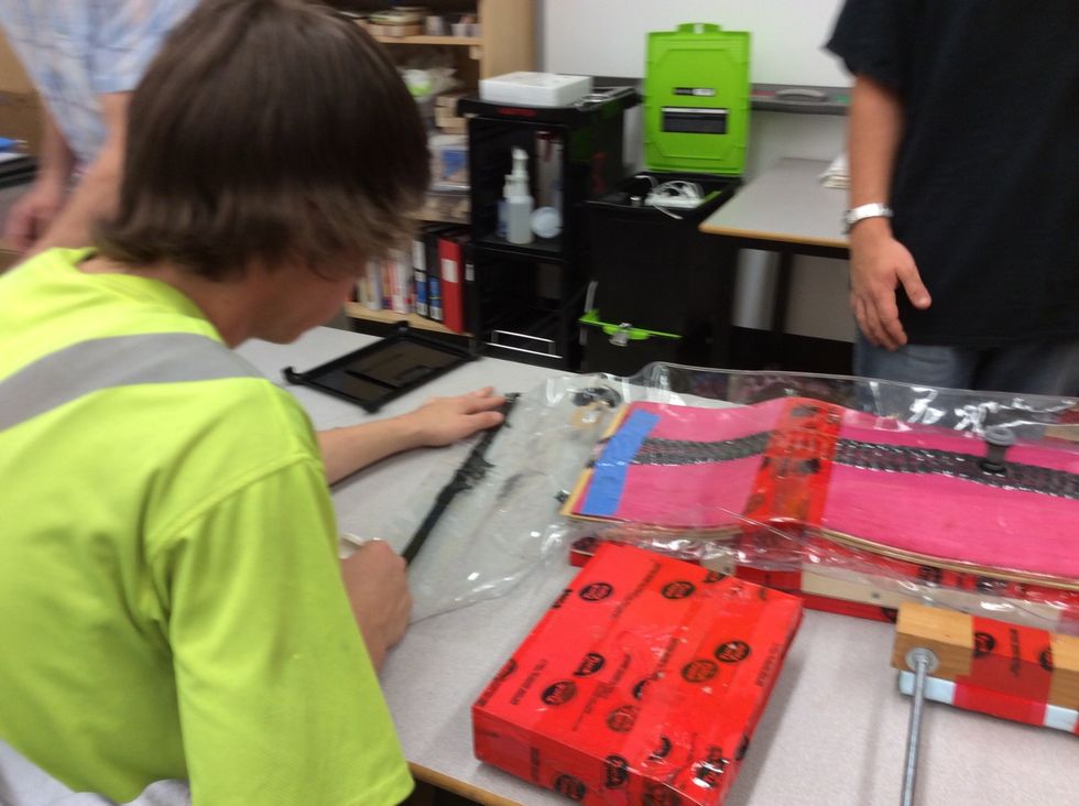 To open the bag. Use the end of a Sharpie marker and roll the tar from the bag onto one side of the seal.