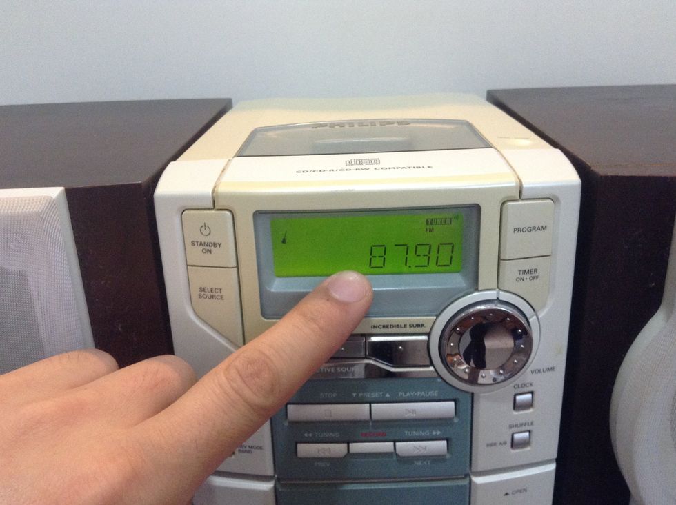 To play iPhone music thru your home stereo set the preset on the radio to the correct station which matches with the setting on the transmitter