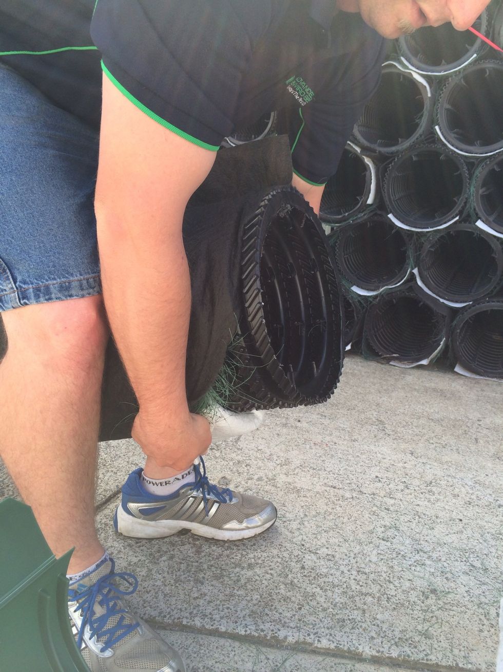 To prepare the AES pipes you need to roll the black fabric, fibres and white bio accelerator back far enough to allow coupling to engage 2 ribs