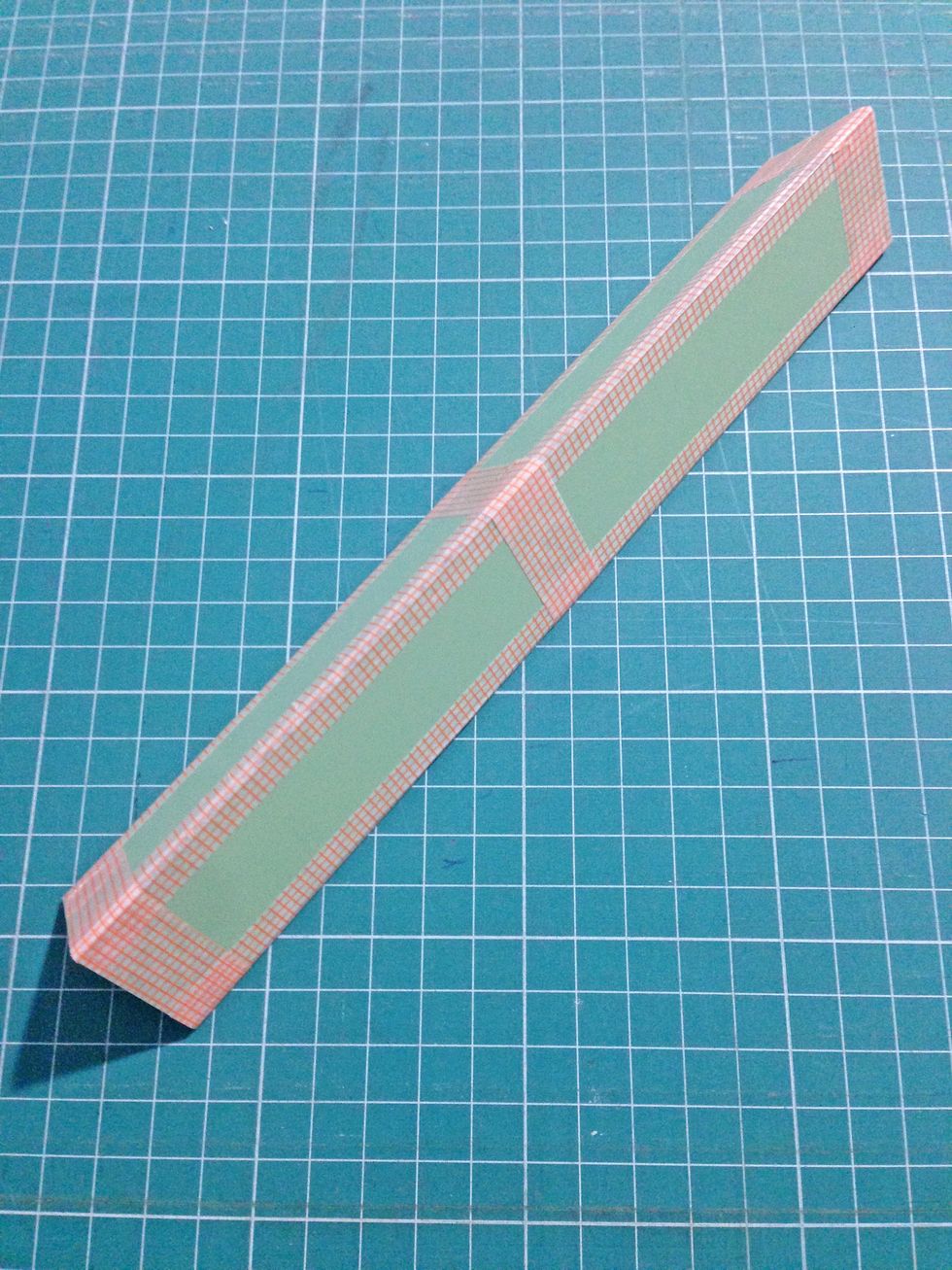 To reinforce the prism, tape around at the ends and center as shown...