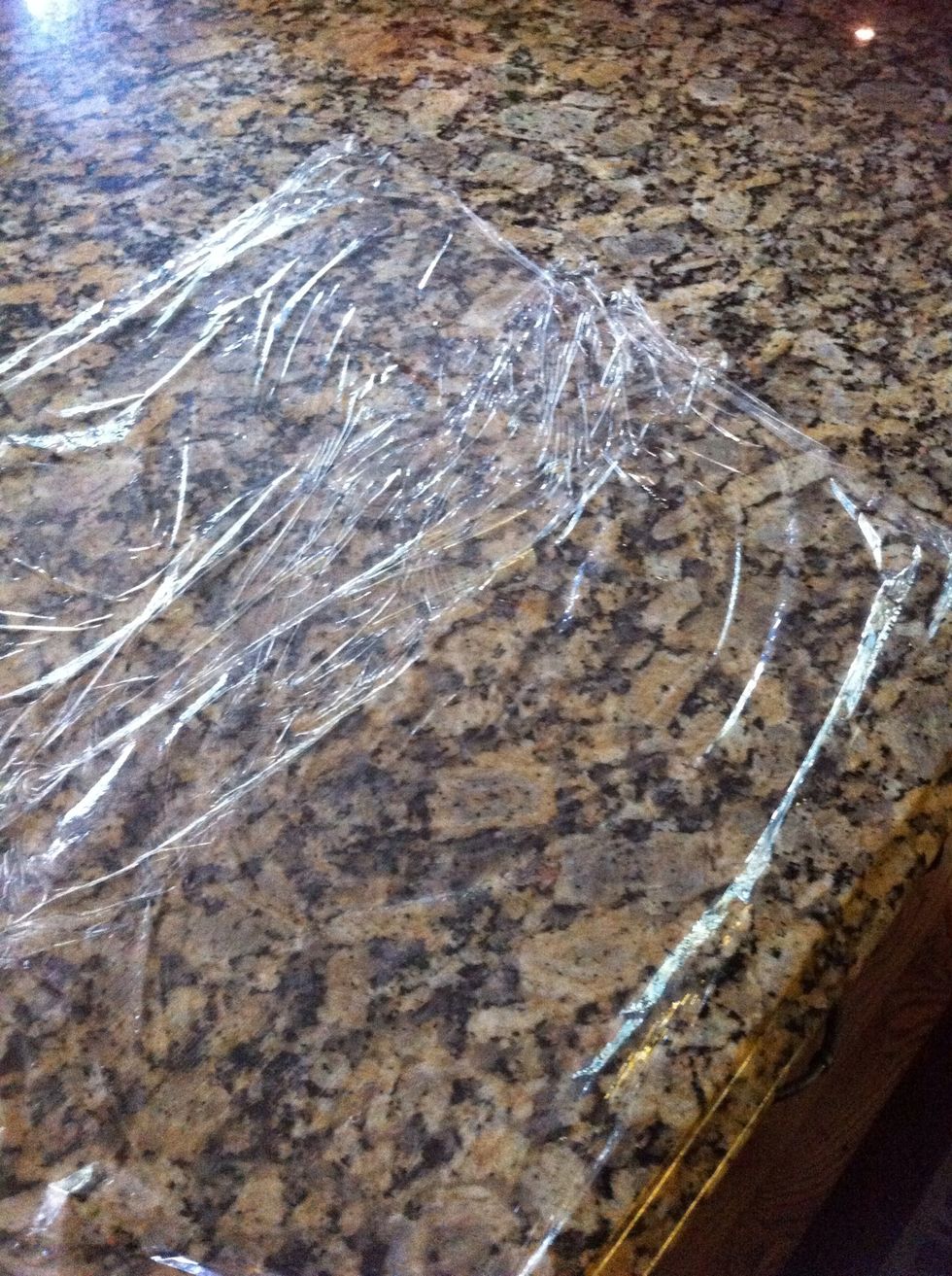 To roll out dough, I lay down two pieces of plastic wrap