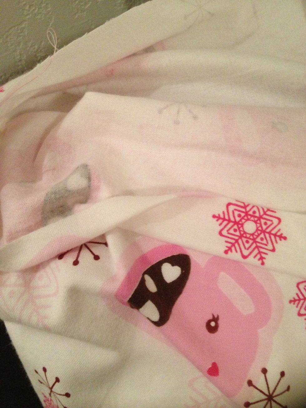 To sew the waistband, I fold the fabric over twice and sew. The first fold is small (a quarter to half an inch) and the second fold is larger (an inch).