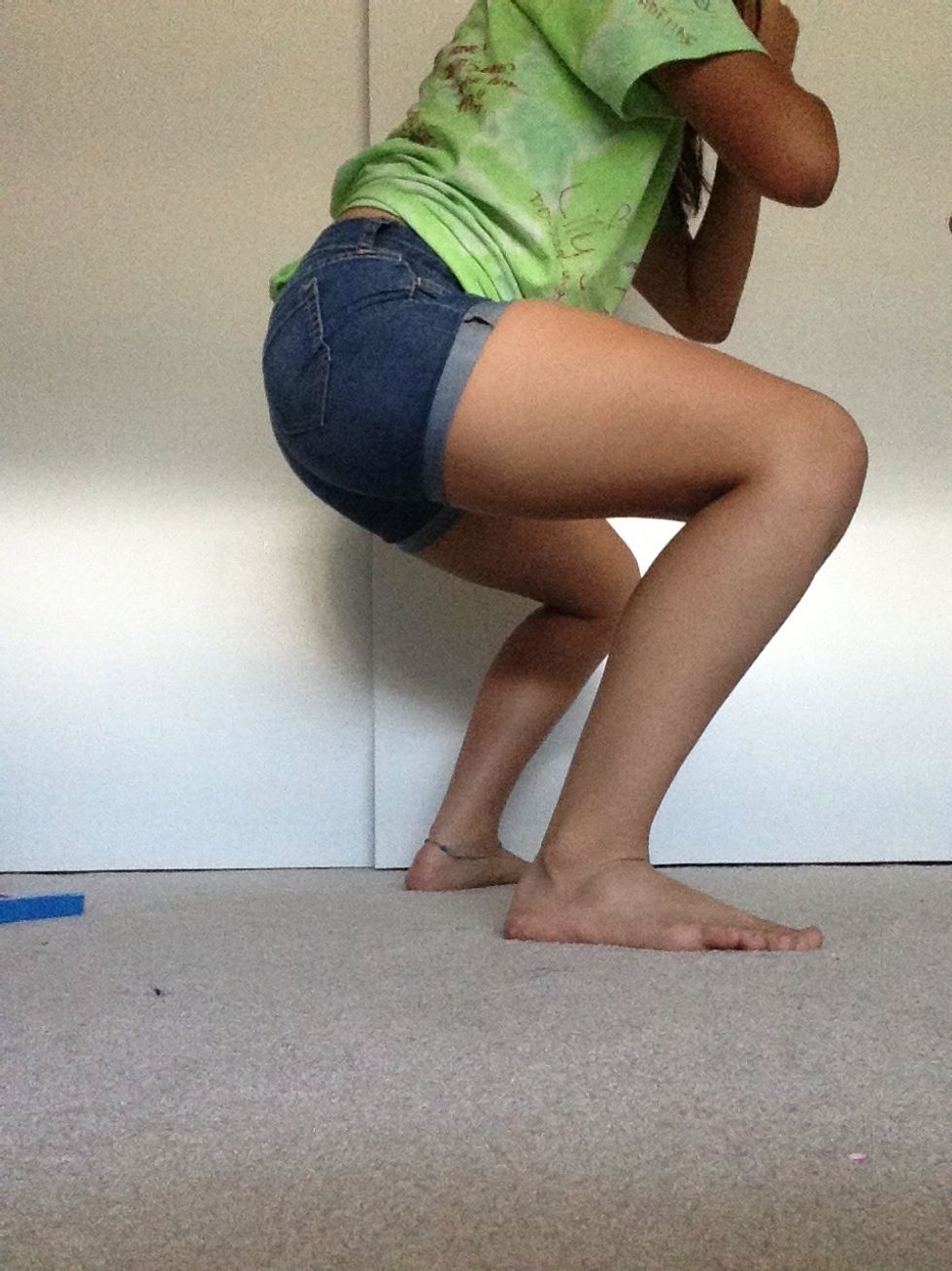 To start off go into a squat position and hold yourself for at least 30 seconds. Make sure your feet are spread apart.