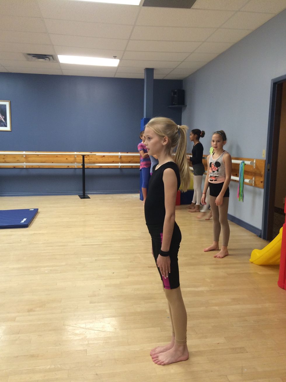 To start you need to raise your feet with your arms beside yourself