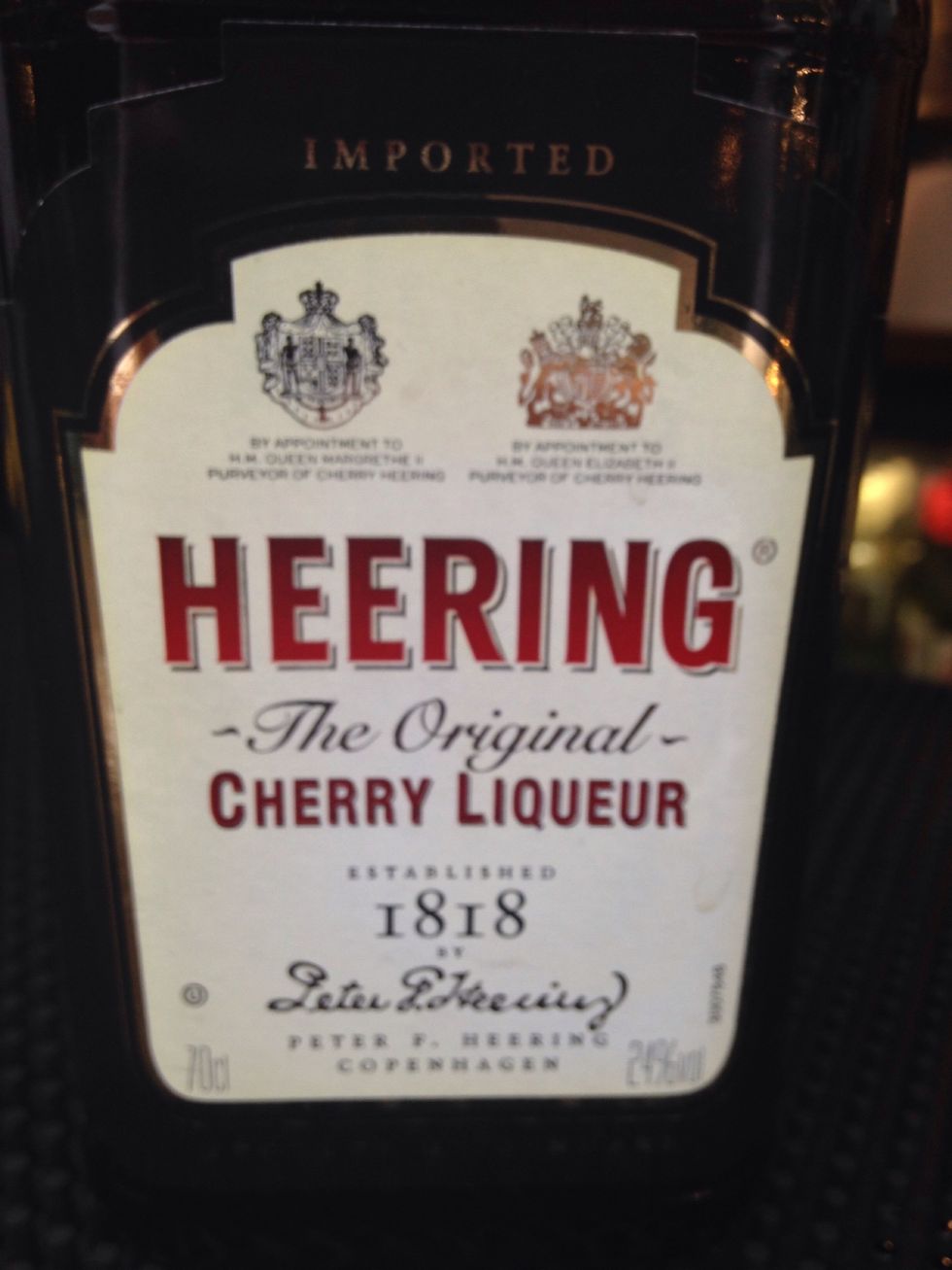 To sweeten it slightly and add to the fruit base we're also going to need 12.5ml (1/2oz) of Cherry Heering liqueur