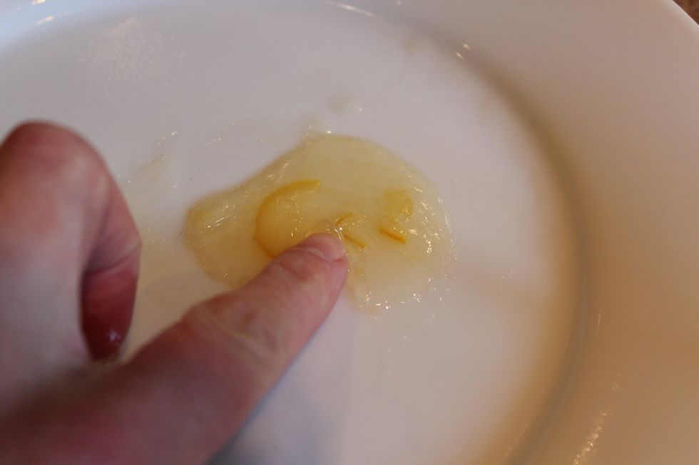 To test if it's ready, put a tbsp of the mixture on your cold dinner plate & wait 30 secs. Tilt the plate. If it runs it needs more time. If it\u2019s gel-like & wrinkles when you touch it, it's ready.