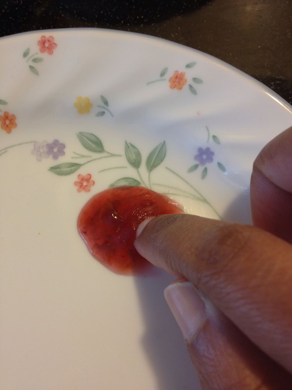 To test readiness, spoon a small amount on the chilled plate, and gently push the jam. If you see light creases, it's ready for jarring \ud83d\ude04. Remember, it will thicken further once cooled.