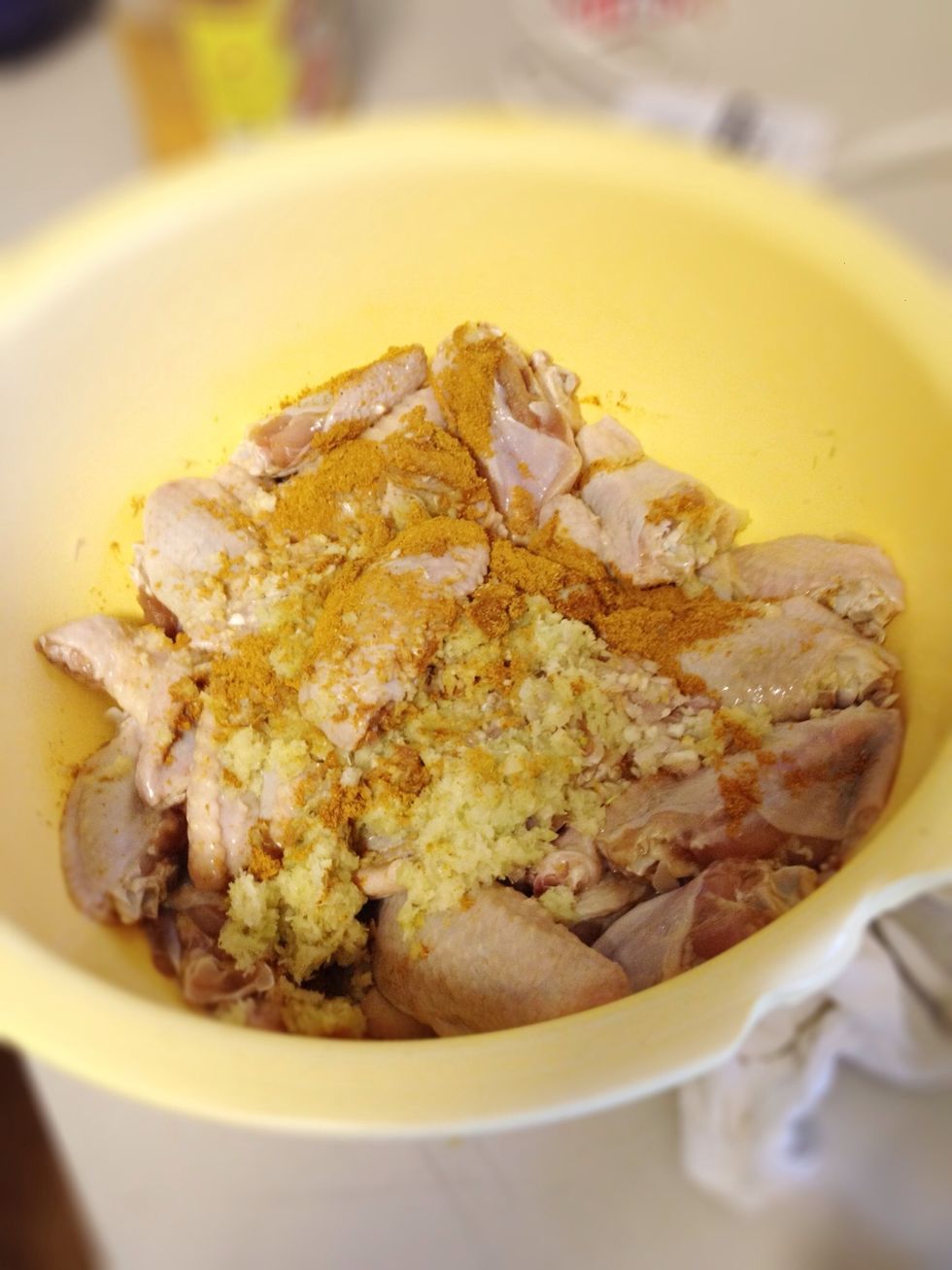 To the chicken, add 3 tbsp of curry powder, vodka, 1/2 tbsp salt & sugar, and half the amount of lemongrass, shallots, and garlic that you processed (the other half will be to make the curry sauce)
