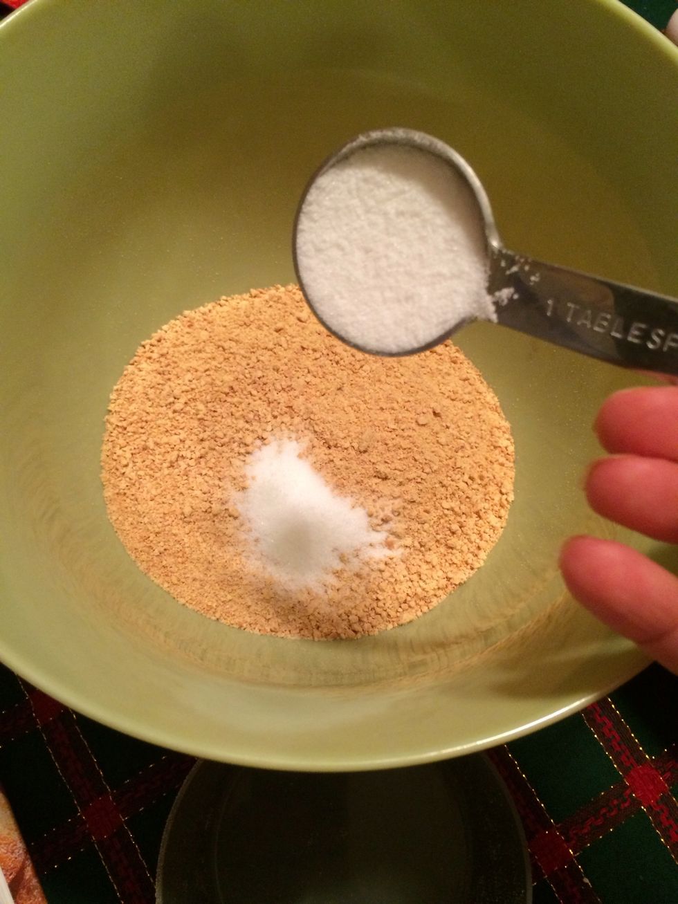 to the crumbs add the sugar