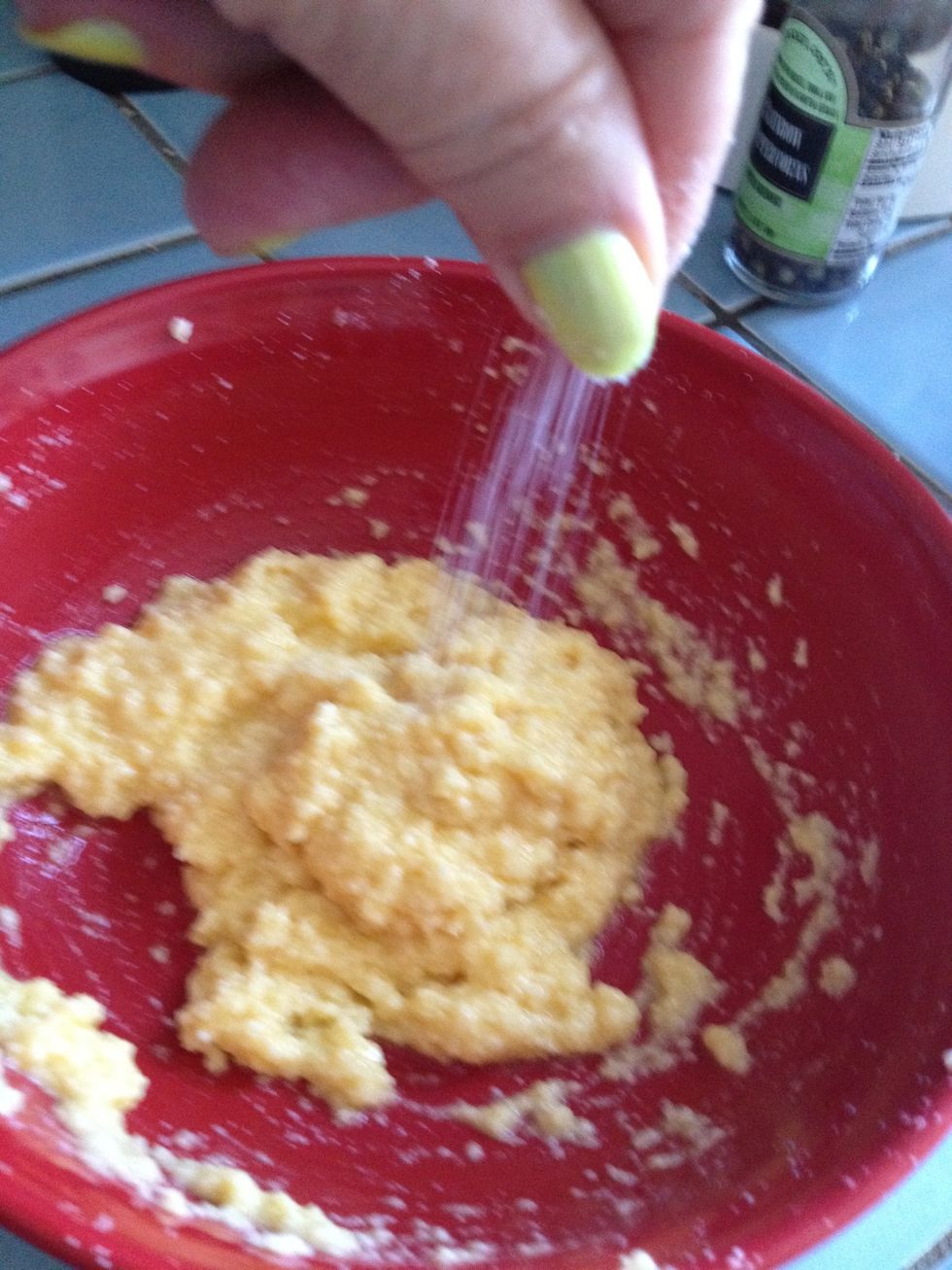 To the egg-cheese mixture, add a pinch of salt.