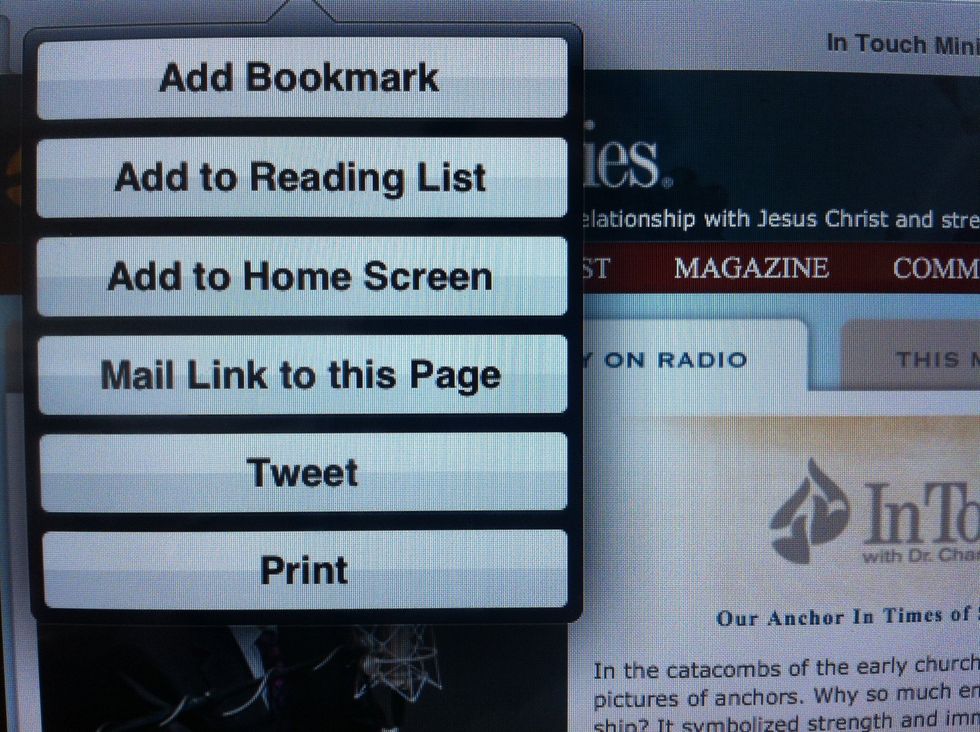 To the left of the address bar, tap the arrow coming out of the box, the menu shown hear will appear