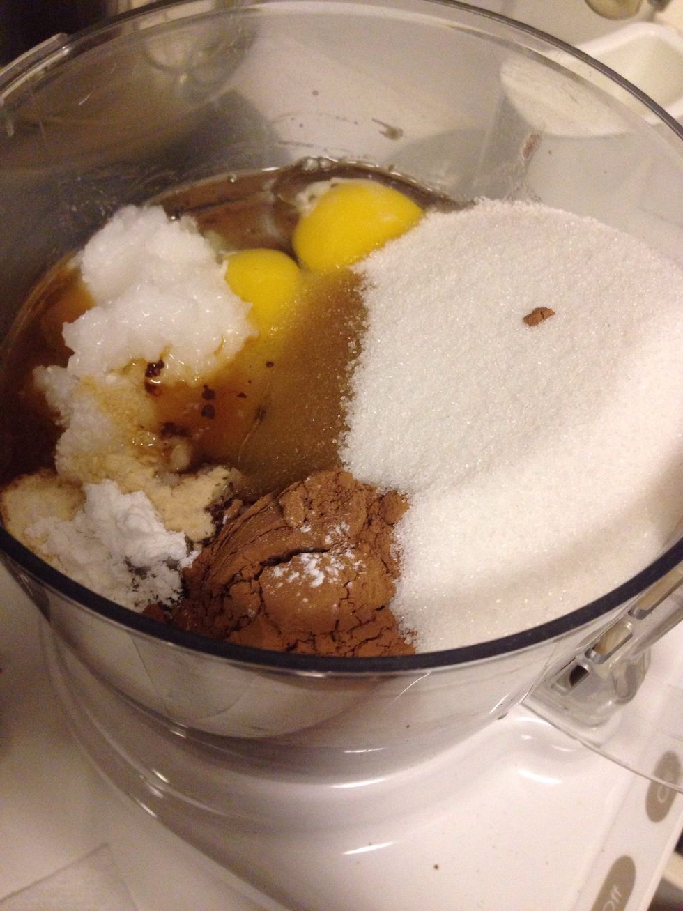 To the pur\u00e9ed beans, add the eggs, coconut oil, cocoa powder, sugar, baking powder, vanilla, and pinch of salt.