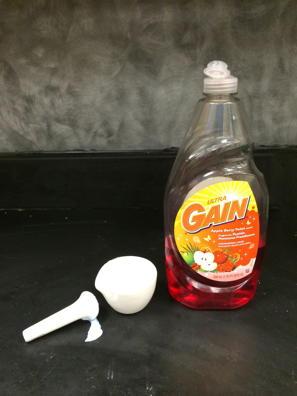 To the TiO2 paste, add a drop of dish detergent. Do not grind or agitate after the detergent is added.