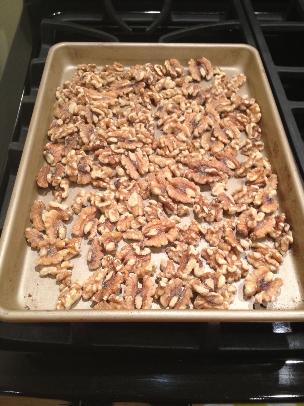 To toast the walnuts, preheat the oven to 375. Spread the walnuts in a single layer on a baking sheet. Place in the oven, and roast until they start to brown and smell fragrant (about 5-10 min).