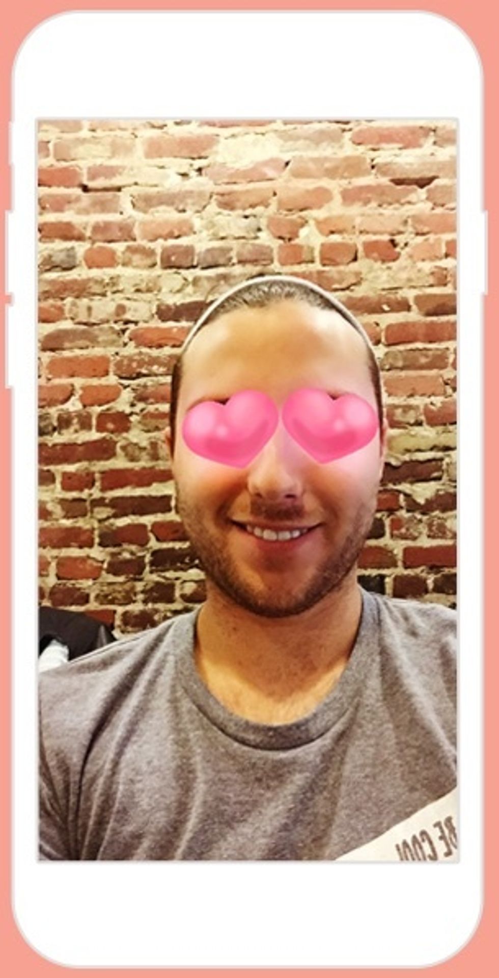 To use this feature, all you need to do is press and hold your face on the screen until it's detected, then swipe through all of the options at the bottom of the screen. Choose one and snap away!